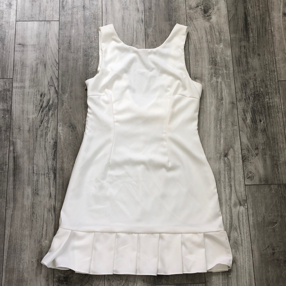 White frill bottom bow back dress